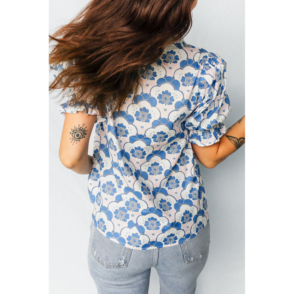 Sky Blue Floral Blouse with Contrast V-Neck Trim in Sky Blue - back fit view