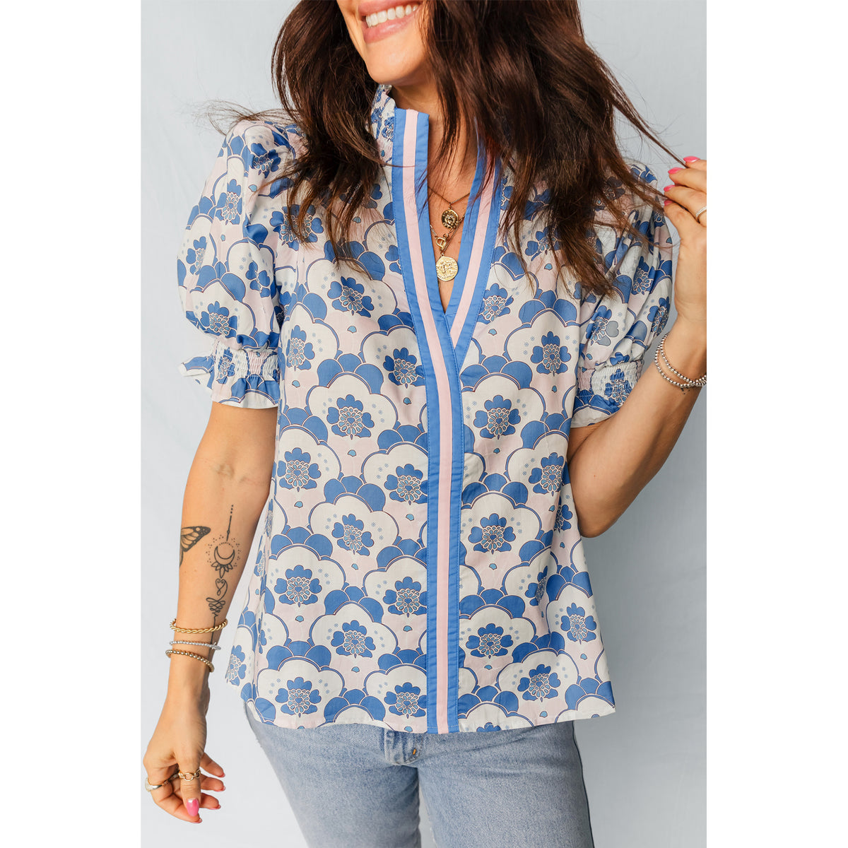 Sky Blue Floral Blouse with Contrast V-Neck Trim in Sky Blue - on-model fit